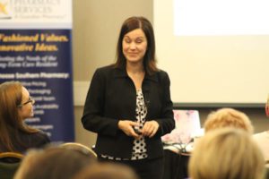 Female motivational speaker, smiling