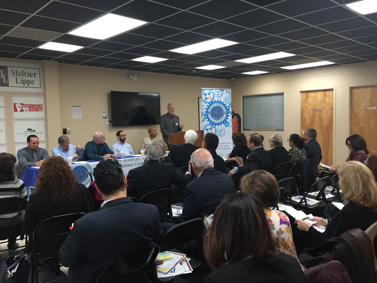 David B. Alexander speaking at a Health & Business Alliance meeting